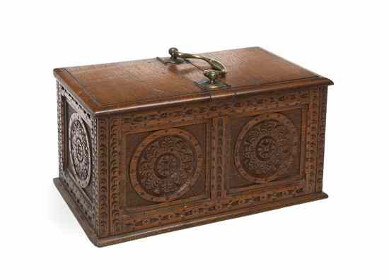 Appraisal: A Carved Oak Tea Caddy of handled rectangular form opening