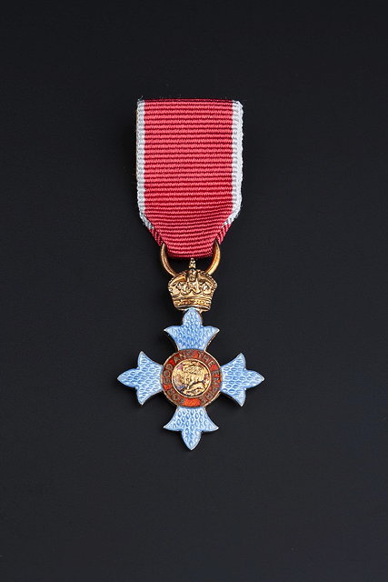 Appraisal: AN ENAMEL MEDAL inscribed 'For God and The Empire' with