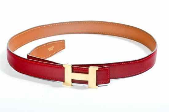 Appraisal: HERM S RED LEATHER CONSTANCE BELT Contemporary With gold-tone H