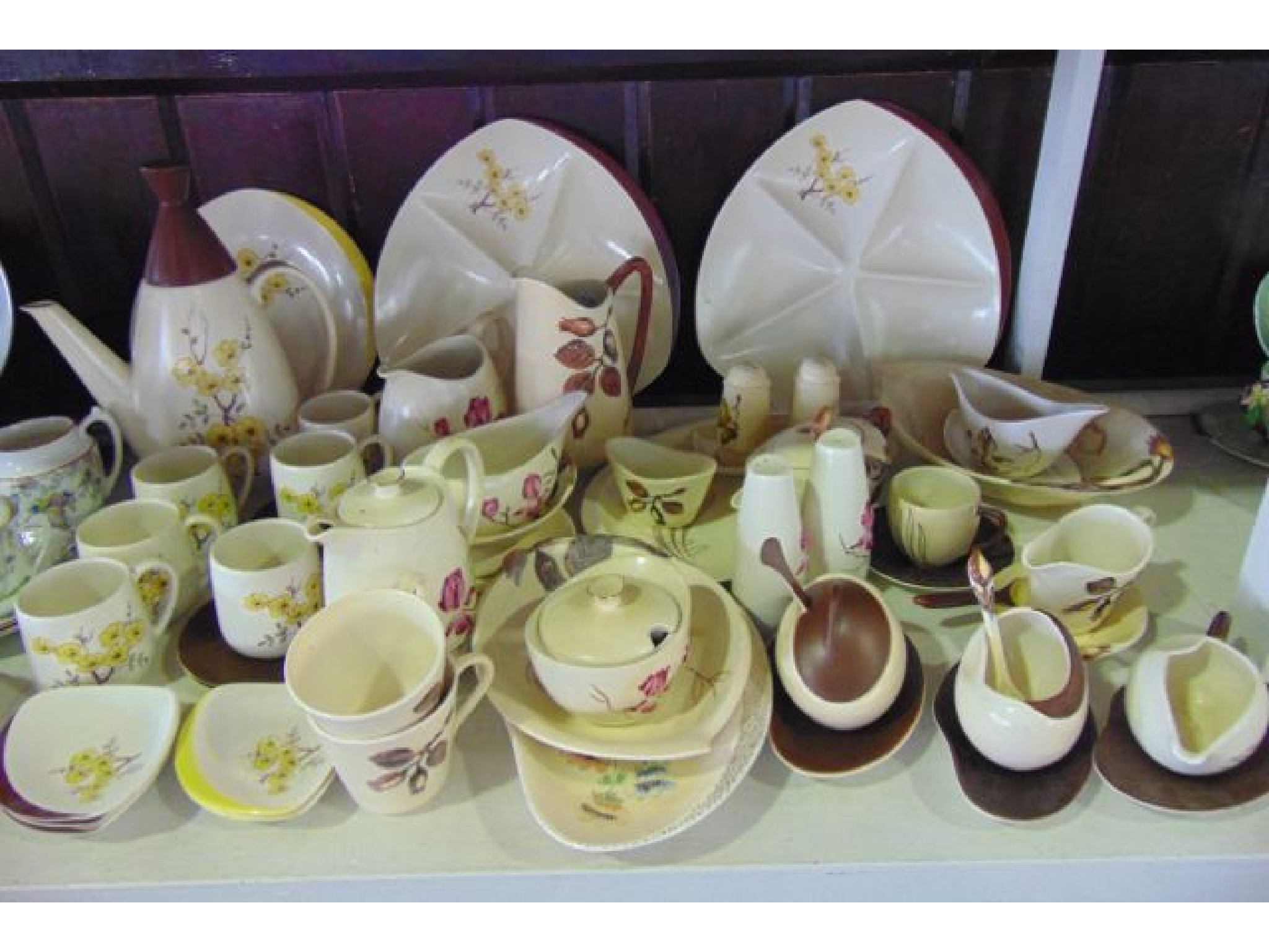 Appraisal: An extensive collection of Carlton wares including cream ground coffee