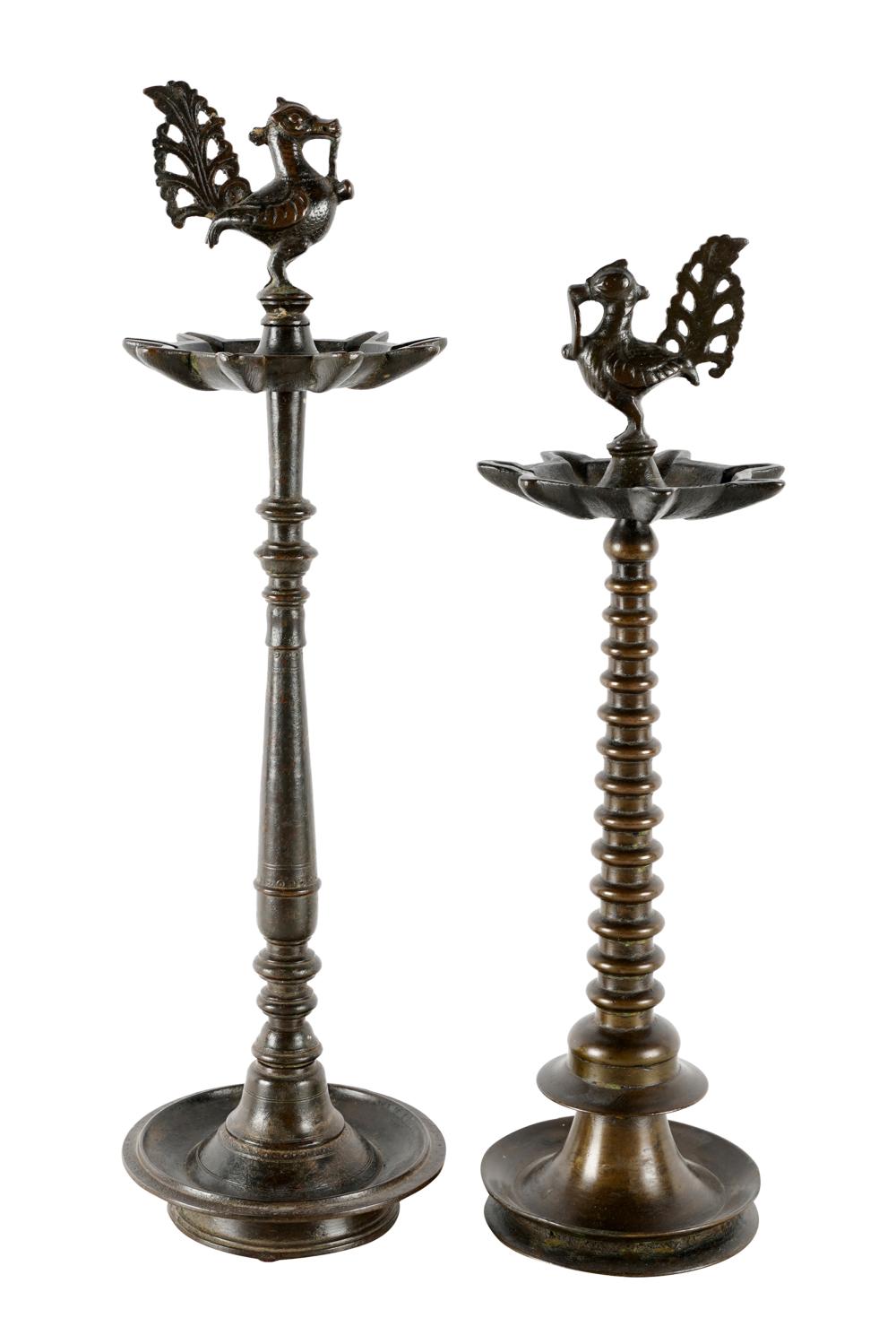 Appraisal: TWO INDIAN BRONZE OIL LAMPSof differing design each with animal-form