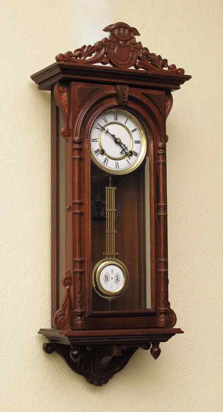 Appraisal: VIENNA REGULATOR STYLE WALL CLOCK th century production carved crest