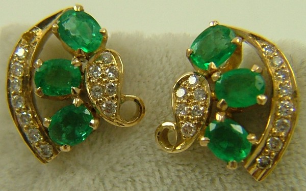 Appraisal: PAIR OF EMERALD AND DIAMOND EARRINGS each K yellow gold