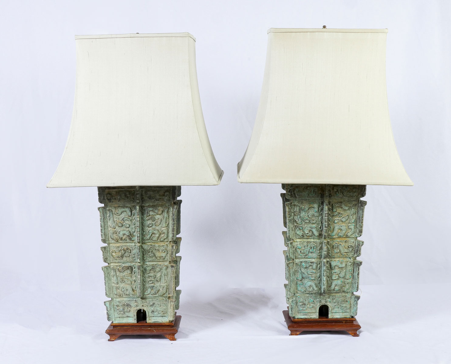 Appraisal: PAIR OF BRONZE CHINESE ARCHAIC FORM LAMPS - Large Chinese