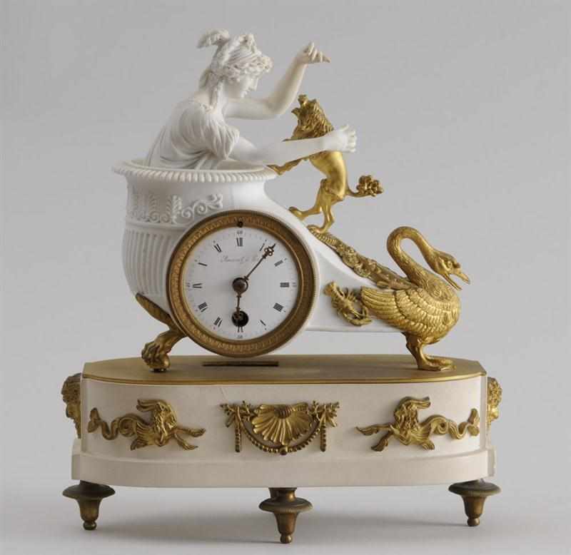 Appraisal: EMPIRE GILT-METAL MOUNTED SEVRES BISQUE PORCELAIN AND COMPOSITION FIGURAL CLOCK