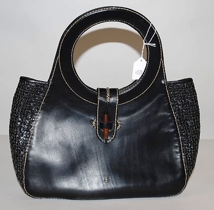 Appraisal: Black leather handbag with woven detail circle handles handmade front