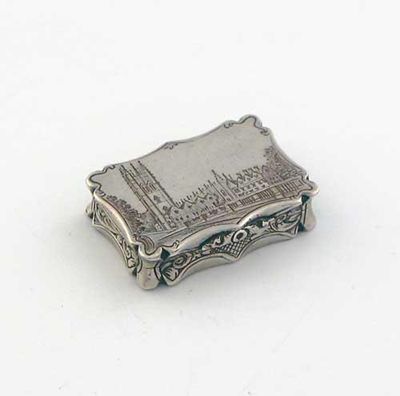 Appraisal: A rare Victorian engraved 'castletop' vinaigrette shaped oblong with scrollwork