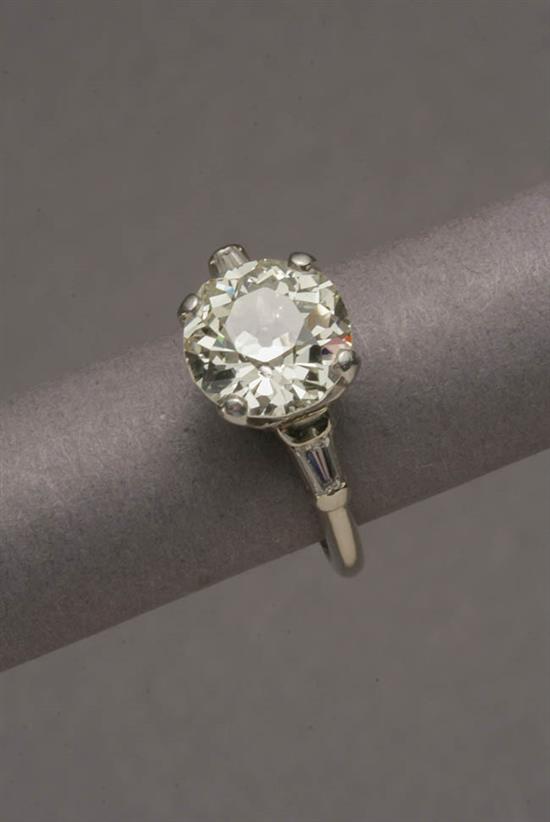 Appraisal: -Karat White-Gold Solitaire Diamond Ring The four-prong mount set with