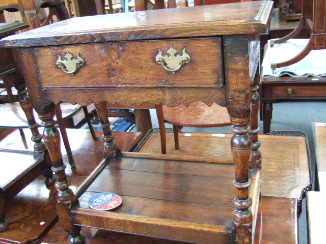 Appraisal: A pair of th century style oak side tables each