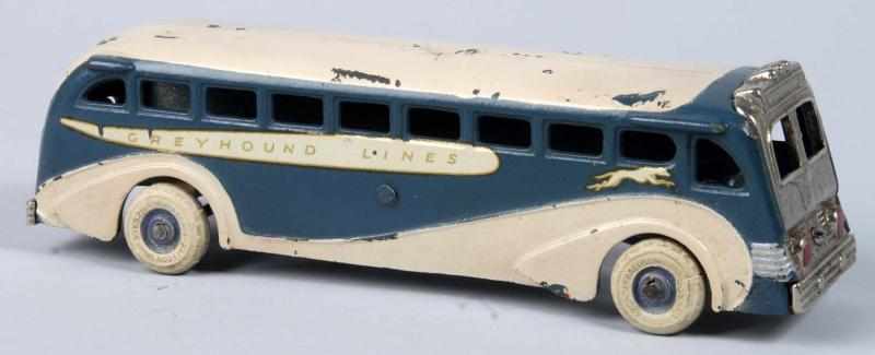 Appraisal: Cast Iron Arcade Greyhound Lines Bus Toy Description American Marked