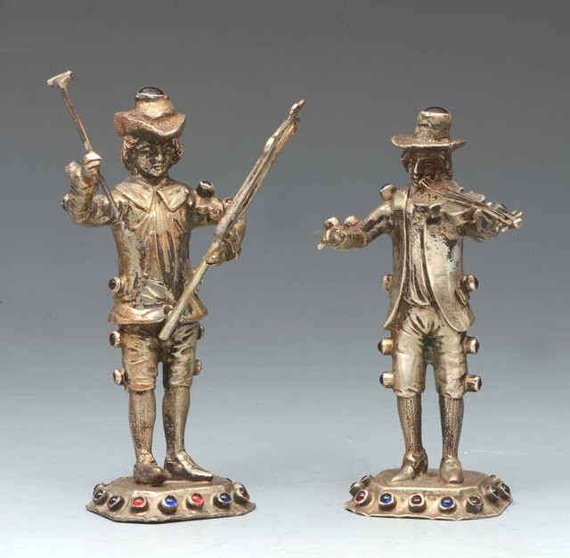 Appraisal: A PAIR OF GERMAN SILVER MUSICIANS probably Simon Rosenau Bad