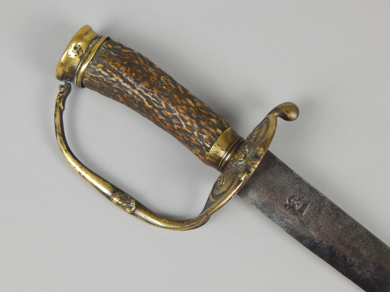 Appraisal: A late th early thC short sword the blade stamped