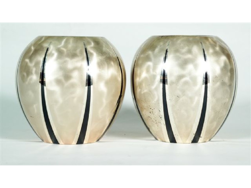 Appraisal: PAIR OF WMF IKORA SILVER-PLATED VASES c each of bulbous