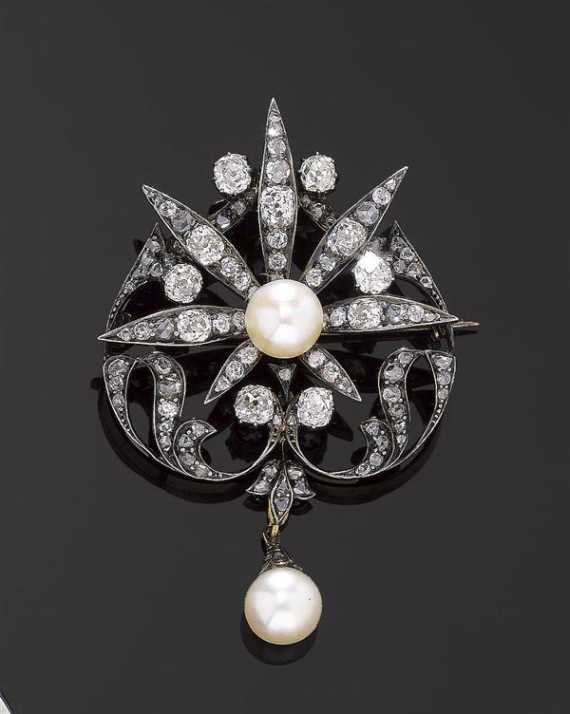 Appraisal: DIAMOND AND PEARL BROOCH ca Silver over yellow gold Attractive