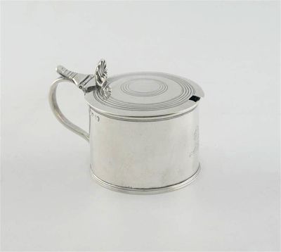 Appraisal: A George IV drum mustard pot with engraved concentric rings