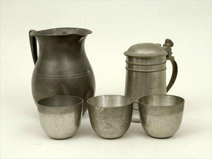 Appraisal: Pewter Measure and Tankard Together with three pewter Jefferson cups