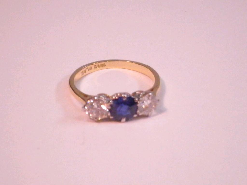 Appraisal: A sapphire and diamond three stone ring stamped ct Plat