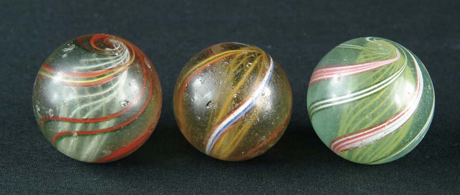 Appraisal: LOT OF LATTICINO MARBLES This lot includes three Latticino Swirl