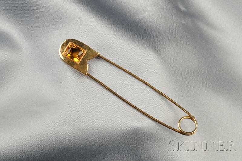 Appraisal: kt Gold and Citrine Safety Pin set with an emerald-cut