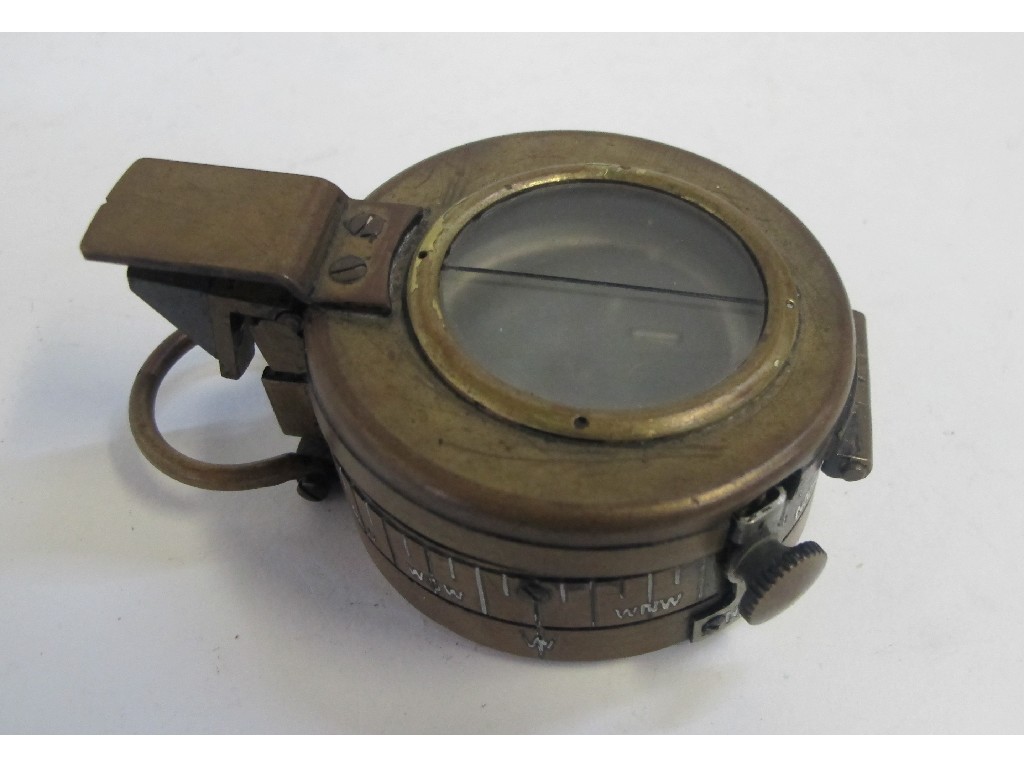 Appraisal: Military issue metal cased compass by T G Co Limited