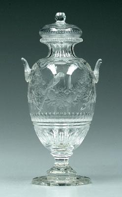 Appraisal: Intaglio cut glass lidded urn fine cut swags with parrots