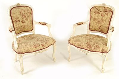 Appraisal: A pair of Louis XV style painted and upholstered fauteuils