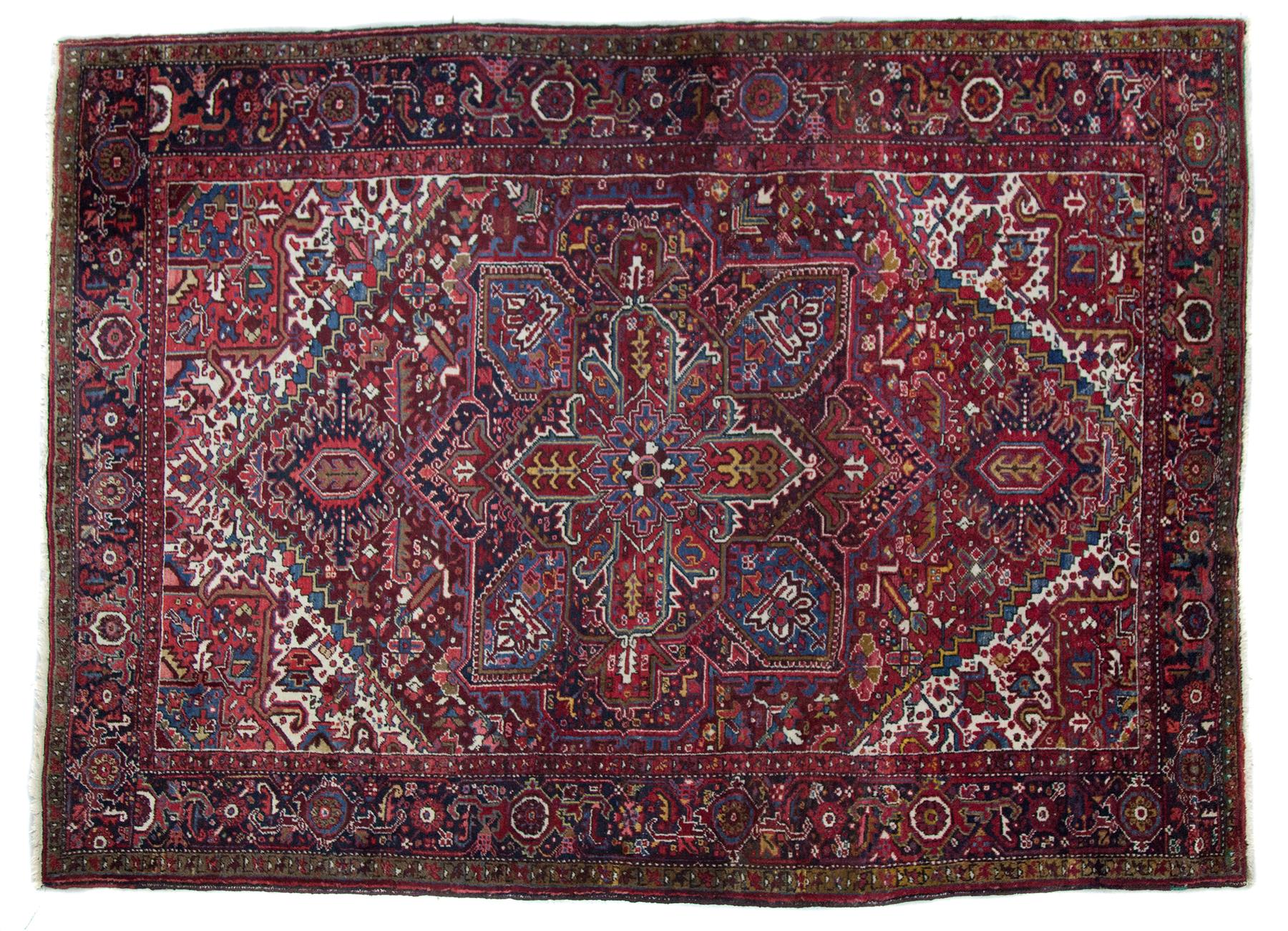 Appraisal: ORIENTAL RUG Mid th century Room size Heriz Red ground