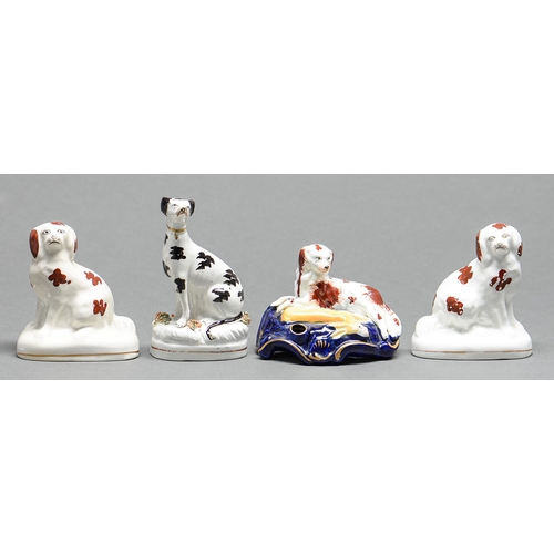 Appraisal: Four Staffordshire earthenware models of dogs mid th c including