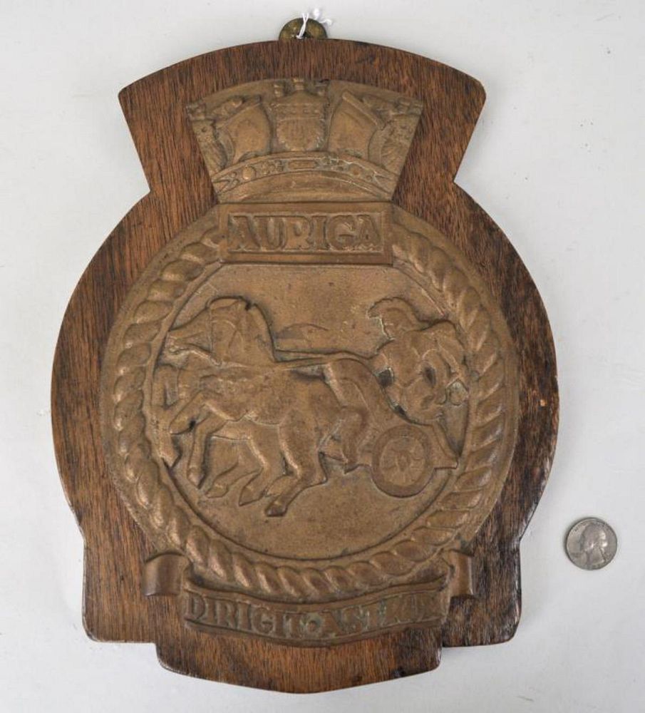 Appraisal: Bronze Ship's Badge Auriga Dirigit Astrum Mounted on wooden backing