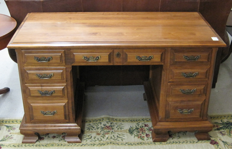 Appraisal: DOUBLE PEDESTAL MAPLE DESK American mid- th century having a