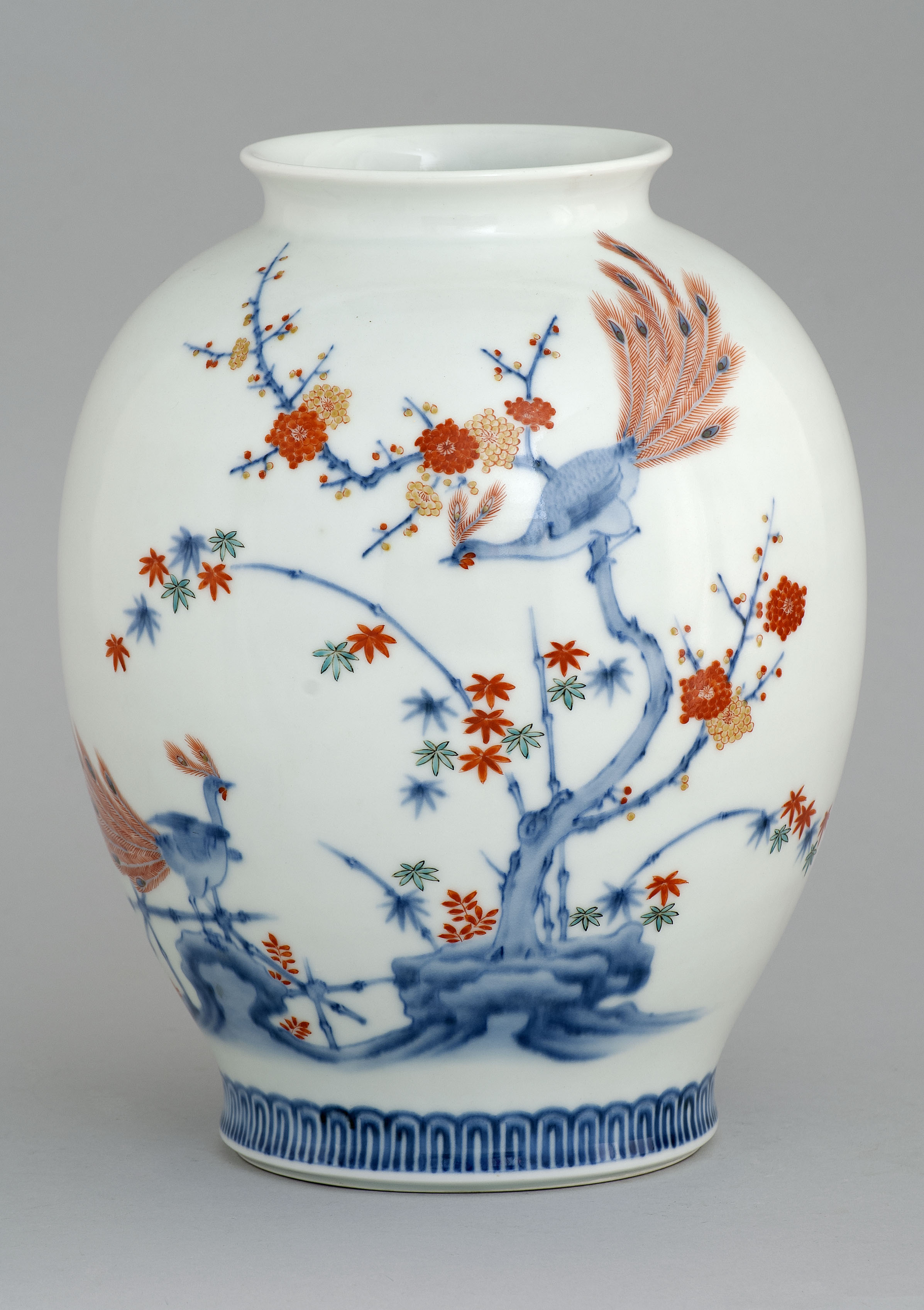 Appraisal: KAKIEMON PORCELAIN VASE Late Meiji PeriodWith peacock and prunus design