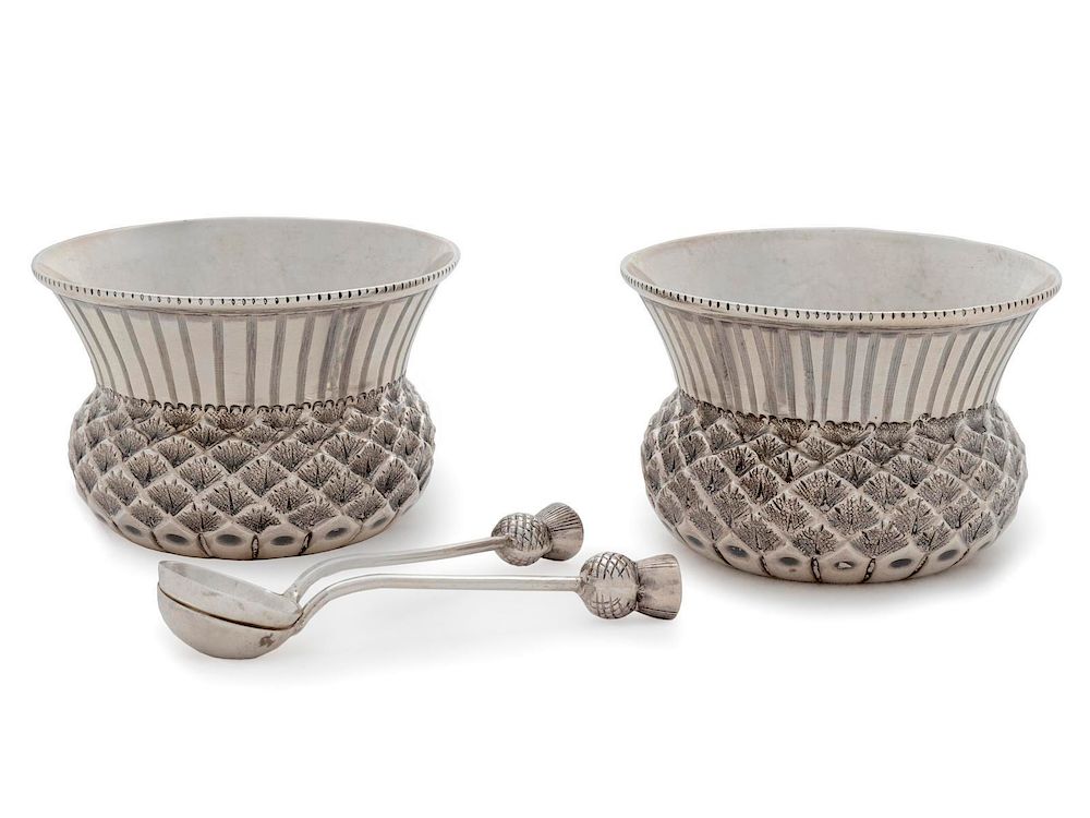 Appraisal: A Pair of English Silver Thistle-Form Salts Height x diameter