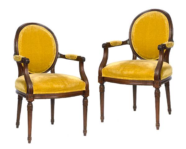 Appraisal: A set of twelve Neoclassical style walnut armchairs height in