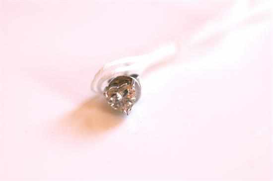 Appraisal: A SINGLE DIAMOND EARRING IN CT WHITE GOLD