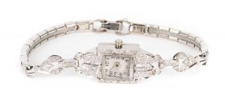 Appraisal: Platinum diamond cocktail watch with sapphires set into the bracelet