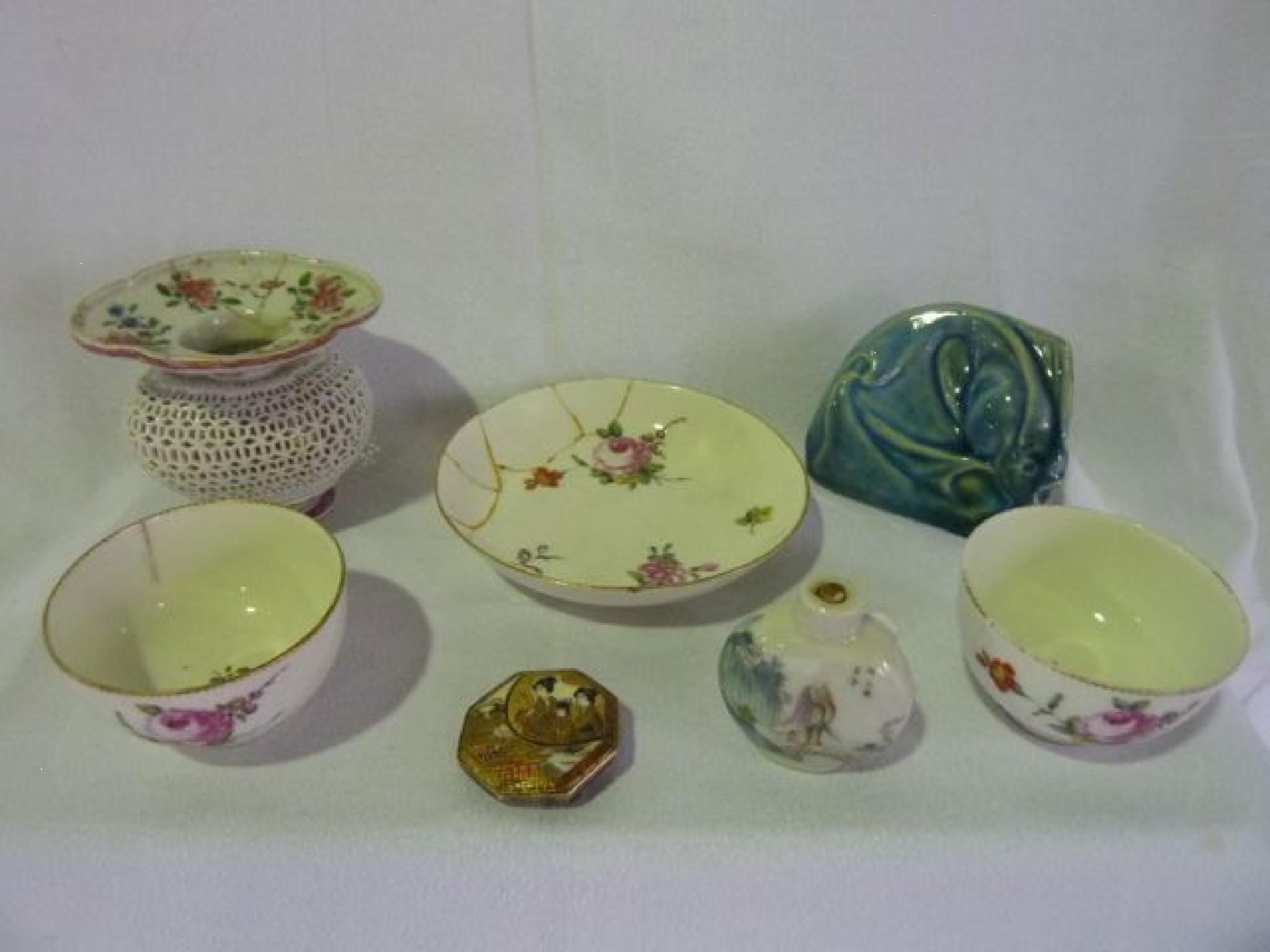 Appraisal: An interesting collection of items including two tea bowls hand