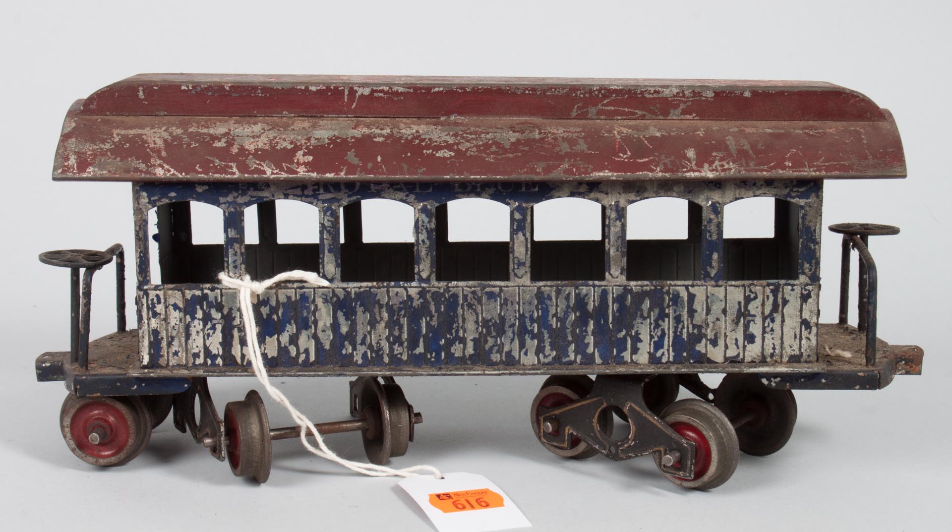 Appraisal: American painted tin plate passenger car before probably Carlisle Finch