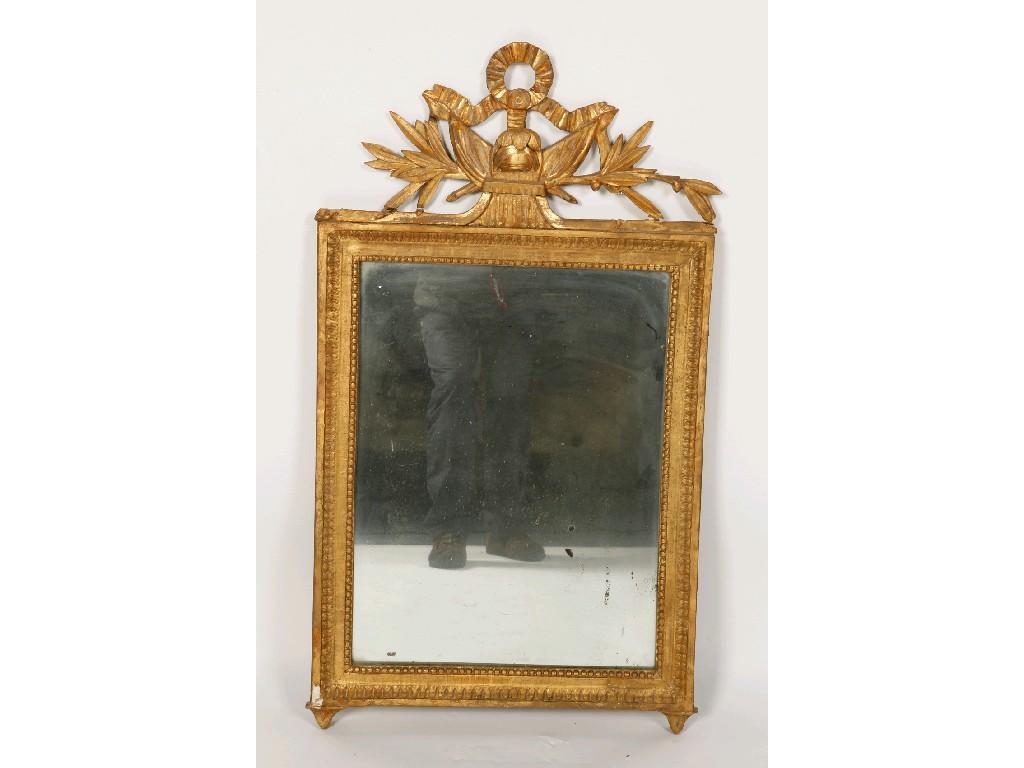 Appraisal: A LOUIS XVI GILTWOOD WALL MIRROR the rectangular plate within