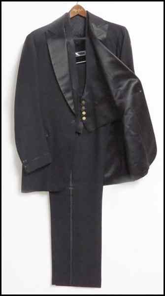 Appraisal: BLACK SILK AND SATIN THREE PIECE TUXEDO Comprising a jacket