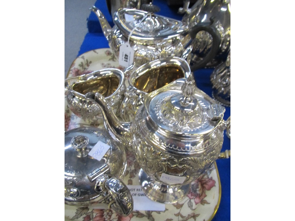 Appraisal: Lot comprising three piece EP tea service and two teapots