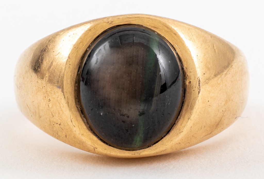 Appraisal: K YELLOW GOLD BLACK STAR SAPPHIRE GYPSY RING K yellow