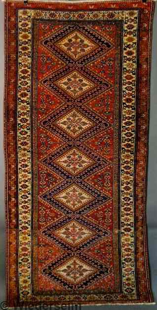 Appraisal: Colorful Caucasian oriental hall runner with seven center medallions 'x