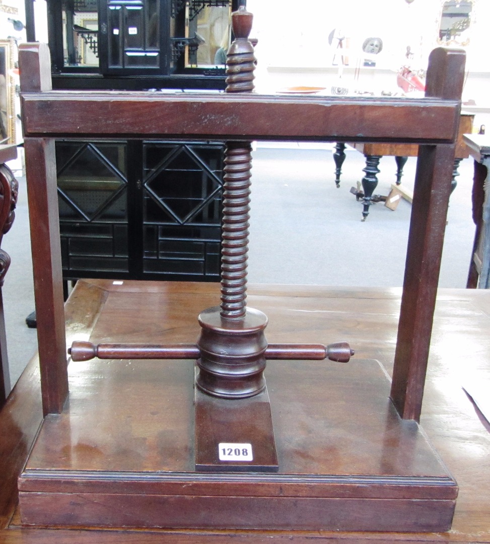 Appraisal: A th century oak and mahogany table top book press