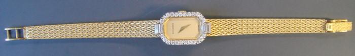 Appraisal: K Diamond Bucherer Wristwatch Yellow gold braded and tapered band