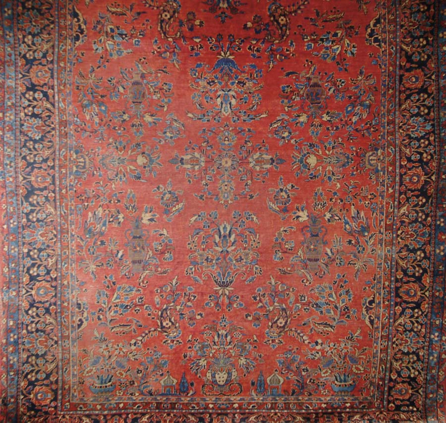 Appraisal: ROOM SIZE SEMI-ANTIQUE SAROUK ORIENTAL RUG Red field has pots