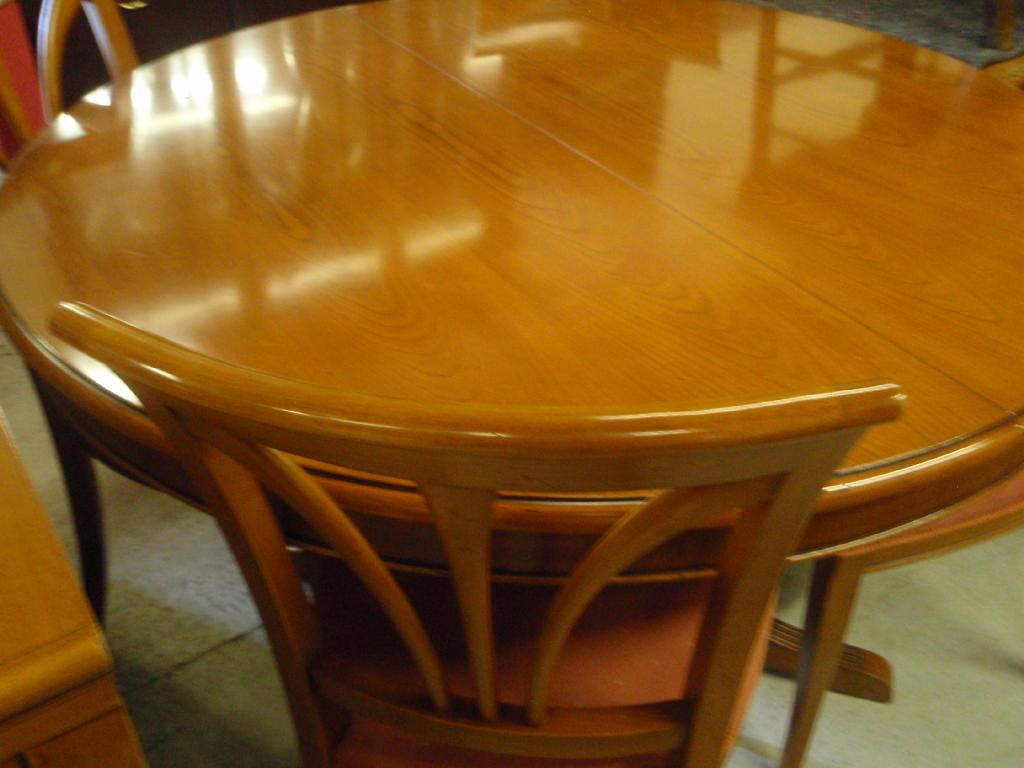 Appraisal: A Selva style international cherrywood finish dining suite comprising circular