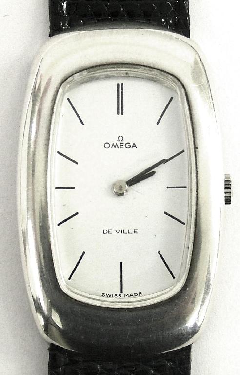 Appraisal: Omega De Ville 's white metal oval gentleman's wristwatch the