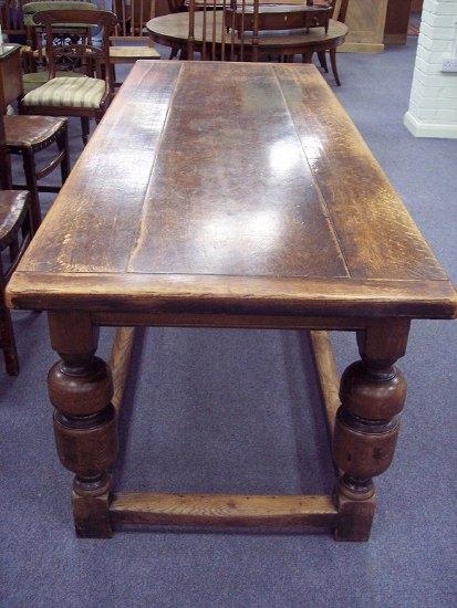 Appraisal: An oak refectory table the triple plank top with plain