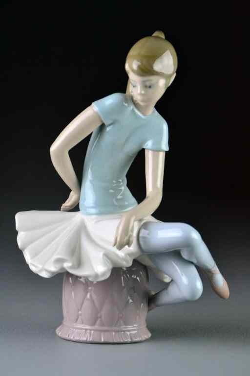 Appraisal: Lladro Porcelain Figurine ''Julia'' Depicting a seated ballerina dated with