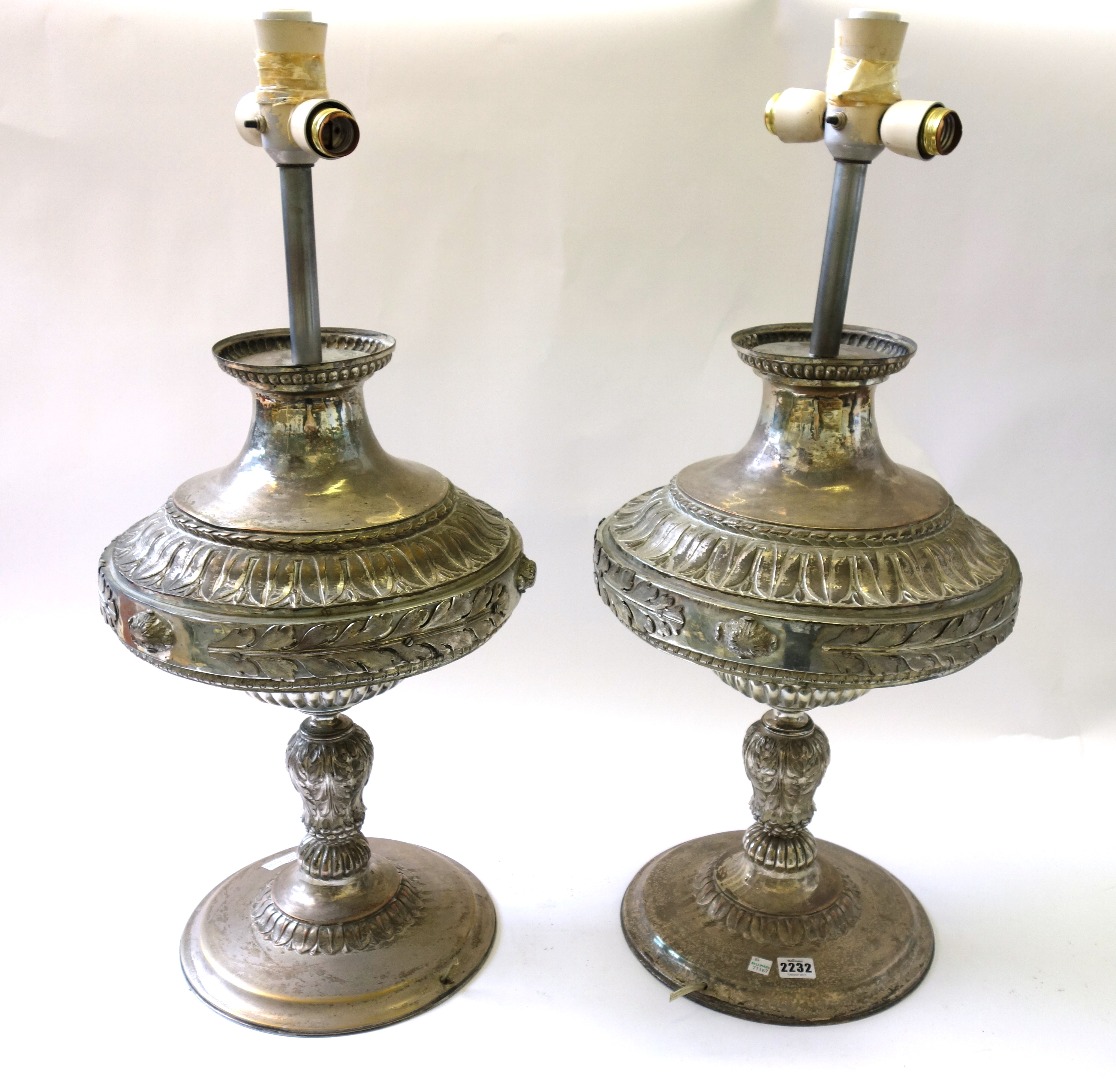 Appraisal: A pair of silverplated copper table lamps th century each